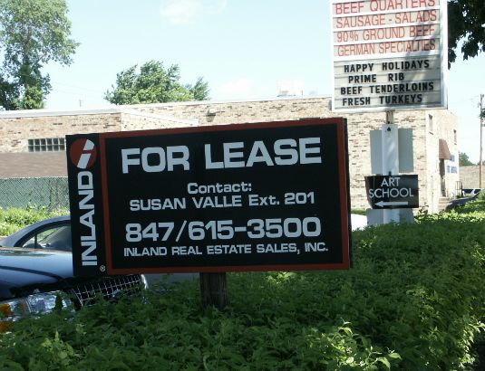 Inland real estate site sign.